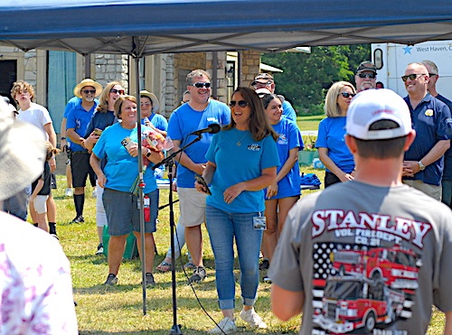 Kara Winum speaks at playground dedication