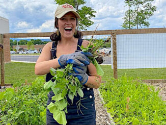 Taylor Alger in the community garden at PMH